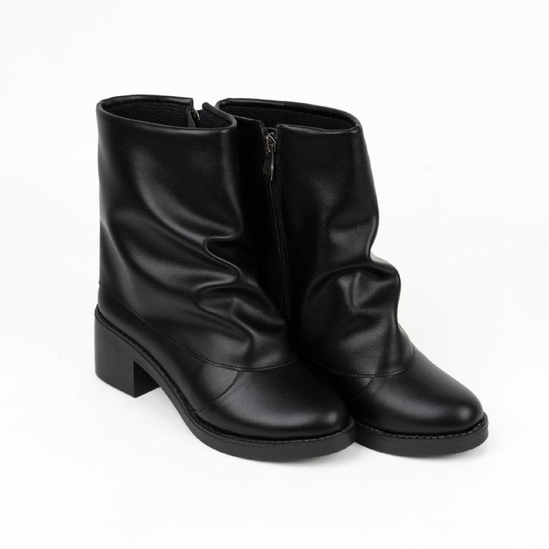 Black slouchy ankle boot with comfortable block heel.