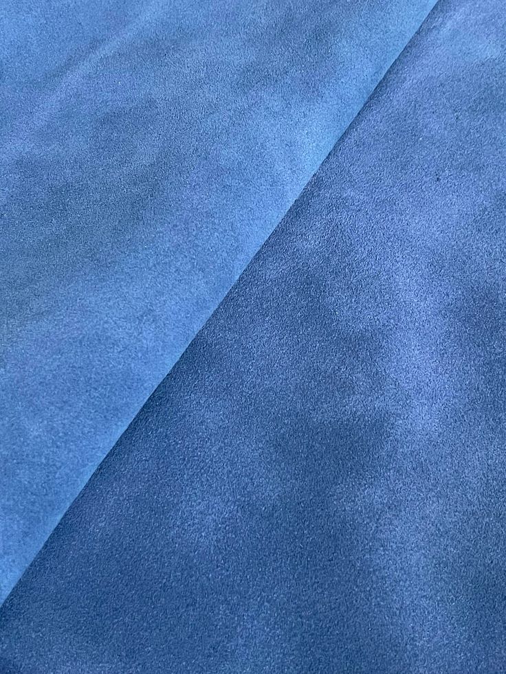 Close-up of Dusty Blue suede fabric with a diagonal pattern