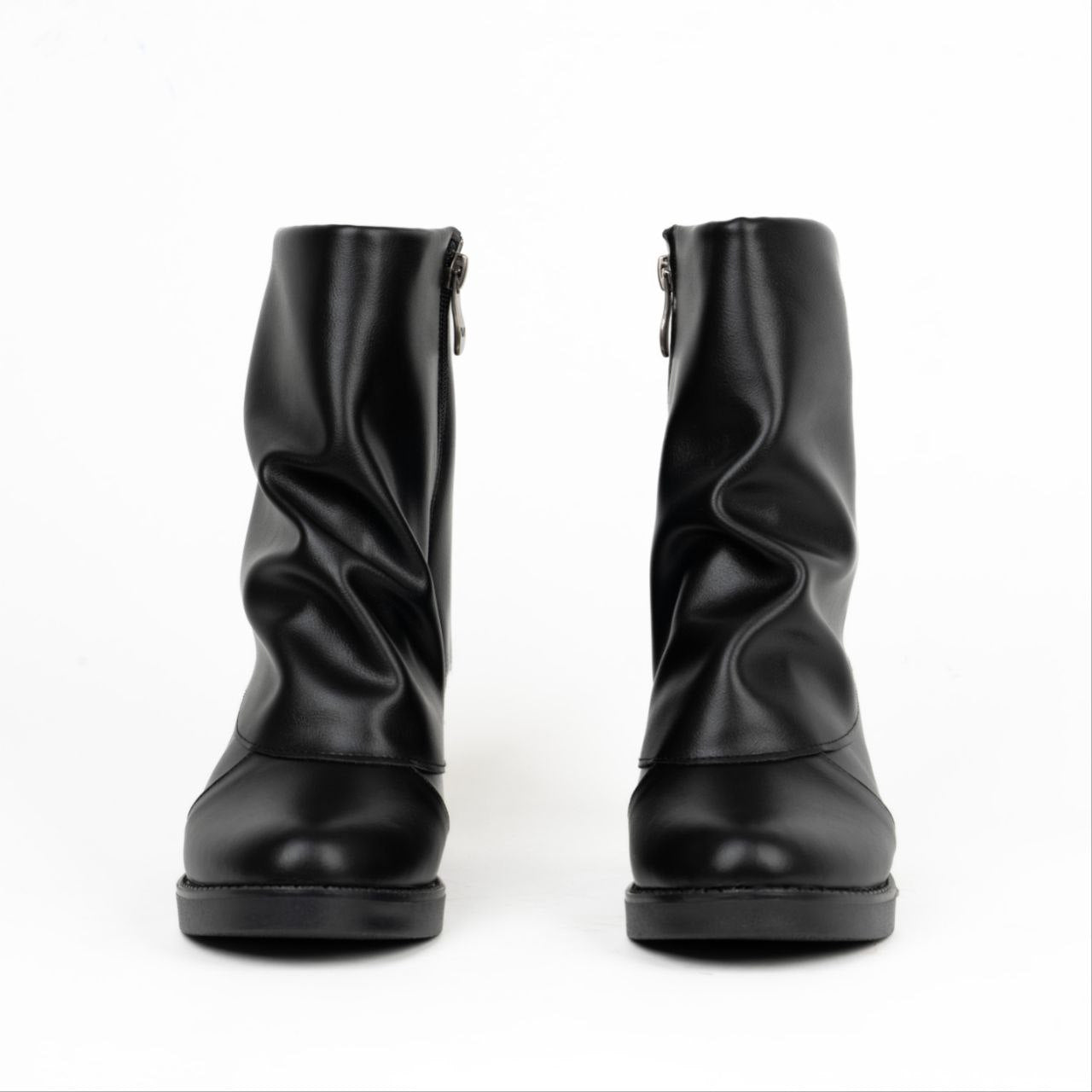 Black slouchy ankle boot with comfortable block heel.