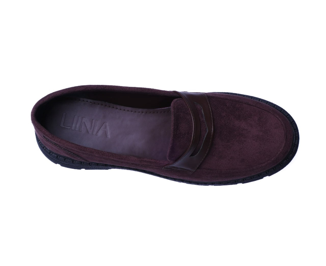 Brown slip-on shoe with 'Liinia' branding on a white background