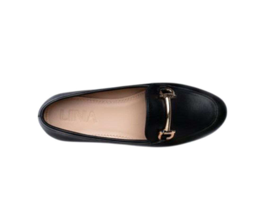 Black loafer shoe with a gold buckle on a white background